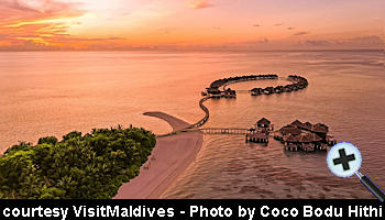 courtesy VisitMaldives - Sunset over Coco Bodu Hithi aerial-view