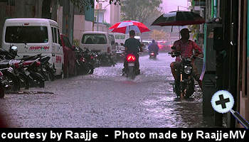 courtesy Raajje - Flooding streets of the capital due to adverse weather 