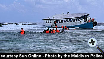 courtesy Sun Online - Police rescues passengers on the ferry that ran aground near Maafushi in Kaafu atoll - (Photo Maldives Police Services)
