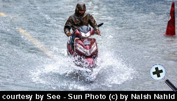 courtesy See - Male streets flooded following heavy rain - (Photo by Naish Nahid)