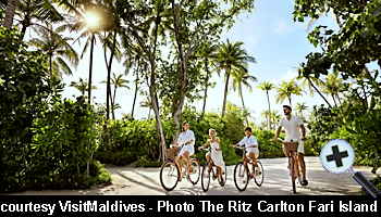 courtesy VisitMaldives -  Cyclists on The Ritz-Carlton Maldives Fari Islands